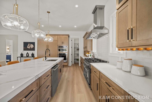 Galley-style kitchen with brass hardware